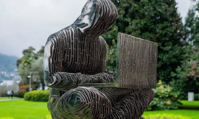 Tether Unveils Satoshi Nakamoto Statue at Plan ₿ Forum in Swiss City Lugano